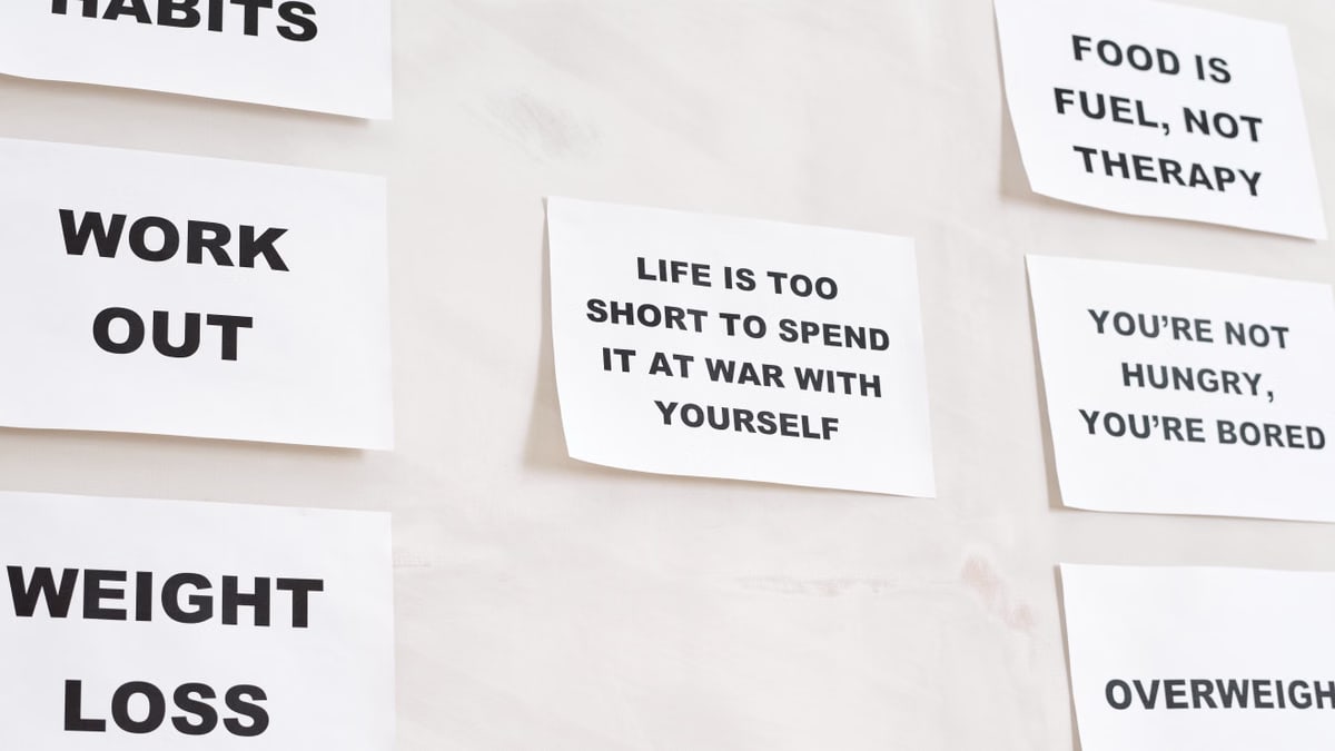 Motivational quotes on white paper promoting healthy habits and lifestyle changes.